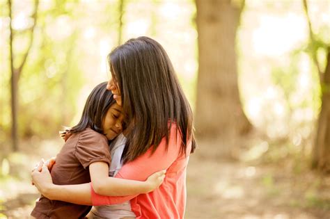 mother and daughter hugging